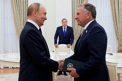 Путин